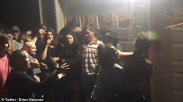 The group of 60 are allowed to keep partying after the officers decide it is not worth shutting down