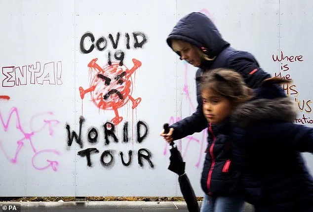 Graffiti that reads 'Covid 19 World Tour' in Edinburgh city centre on Monday