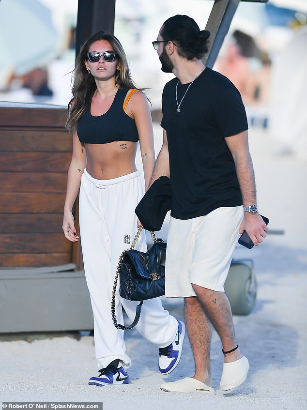 Outing: The French model, 20, who was dubbed 'the most beautiful girl in the world' when she was six-years old, appeared carefree as she enjoyed the sun-soaked beach trip