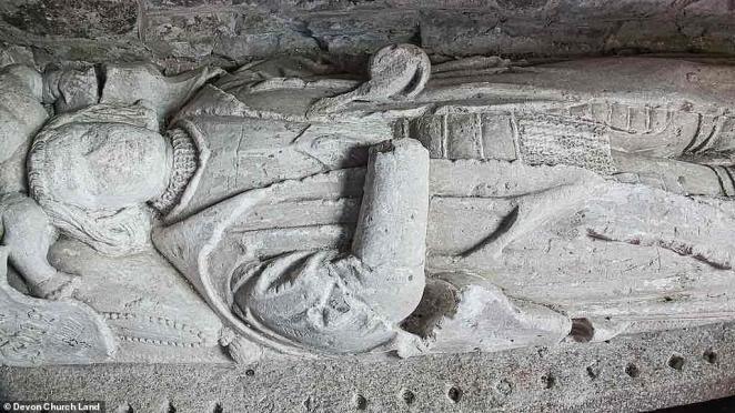 There is an effigy in the church that includes a scar on the chin, matching a similar image of a face that holds a crown in the stained glass window of Edward V