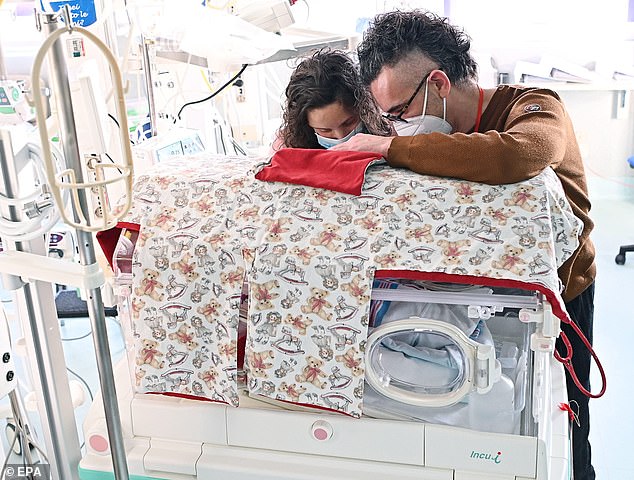 Teresa and baby Alma are now both recovering well, and were able to see each other for the first time on Christmas Day (pictured). Doctors hope to discharge them both within weeks