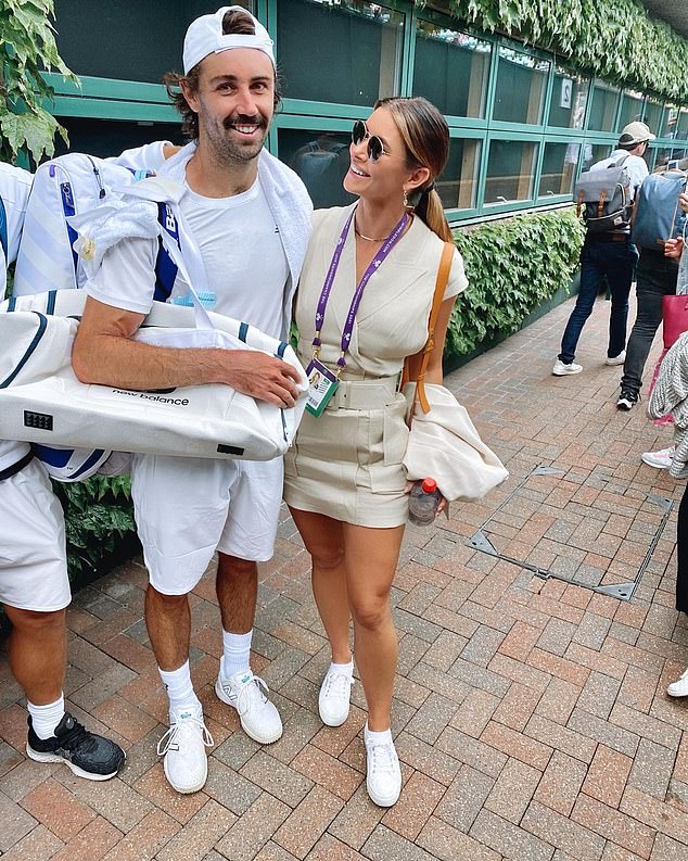 On the road:  The couple, who first met on celebrity dating app Raya, have travelled across Europe and the United States for his matches. Pictured together at Wimbledon