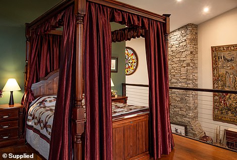 Up the spiralling staircase, is the mezzanine main bedroom that overlooks the living area and has a huge walk-in wardrobe, luxurious ensuite and a private deck overlooking the picturesque views