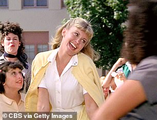 Tell Me More! The cheeky comedian was transformed into 'good Sandy' as played by Olivia Newton-John