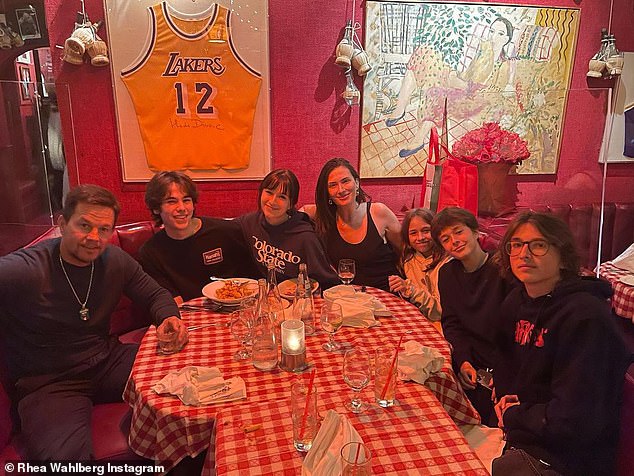 Mom approves: Wahlberg's wife Rhea, 43, seems to approve as well as she posted a beautiful family portrait - with James in it - on November, 2021, with the caption, 'Family'; From left Mark, James, Ella, Rhea, Grace, 12, Brendan, 13, and Michael, 15