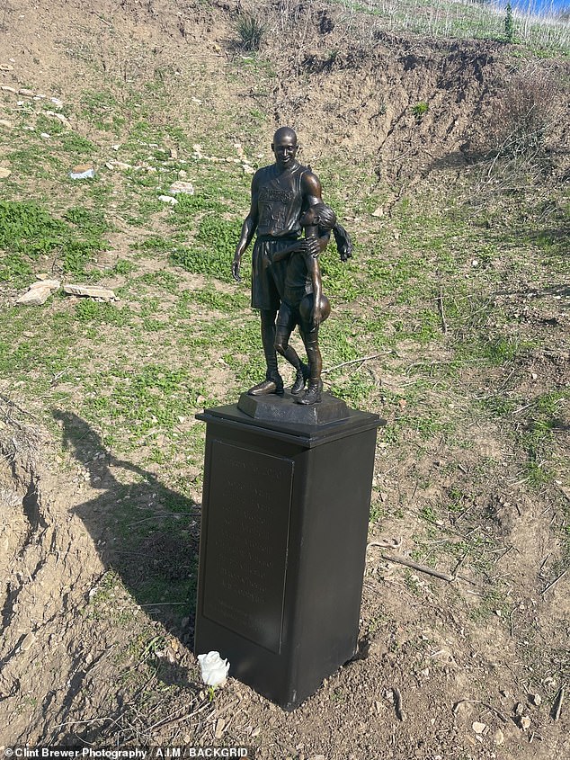 The statue also pays tribute to the other seven victims with their names on a plaque