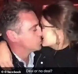 Andrew O'Keefe, 46, was filmed kissing a mystery brunette woman during a night out in Hobart