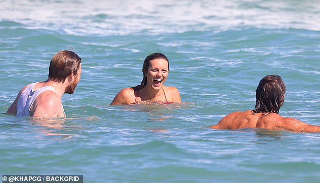 Loving life! Leila couldn't wipe the smile off her face as she joked with her pals in the water