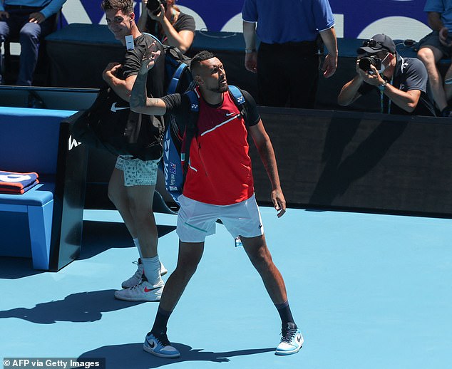 Aussie, Aussie, Aussie! Kyrgios pumps up the crowd as he arrives on court with his doubles partner Thanasi Kokkinakis on Thursday