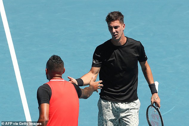 Kokkinakis and Kyrgios come together during their men's doubles semi-final match on Thursday