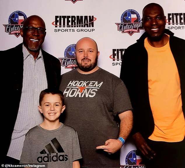 The man and his son also got their picture taken with former Rockets and University of Houston teammates Clyde Drexler (left) and Hakeem Olajuwon (right)