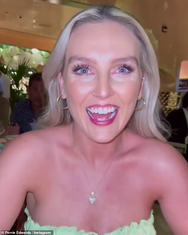 Holiday spirit: Perrie has been enjoying her break in the Middle East with her loved ones after jetting out to the United Arab Emirates earlier this month