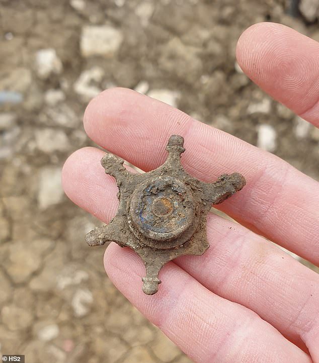 'The HS2 archaeology programme has enabled us to learn more about our rich history in Britain,' said HS2 Ltd's Helen Wass. Pictured: a Roman brooch from Fleet Marston