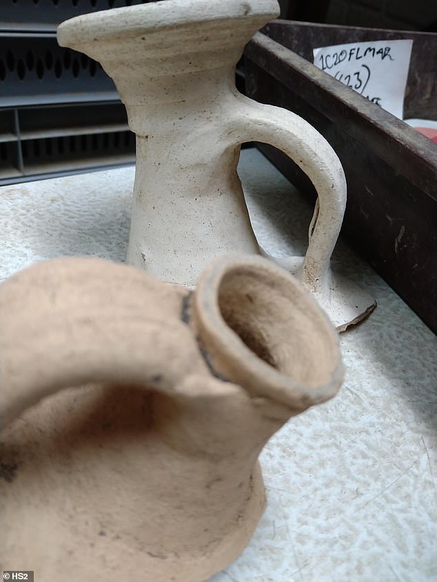 The discovery of more than 1,200 coins at the site — as well as several lead weights — indicate that the settlement was once home to commerce and trade. According to the researchers, it is possible that parts of the widened road may have been used as a market, with traders setting up carts and stalls. Pictured: examples of Roman pottery unearthed at Fleet Marston