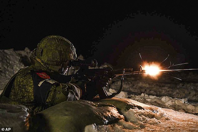 In recent months, Russia has conducted a series of joint drills with Belarus and repeatedly sent its nuclear-capable long-range bombers to patrol the skies over its neighbour, which borders Nato members Poland, Lithuania and Latvia. (Above, a Russian soldier taking part in a military exercise on Saturday)