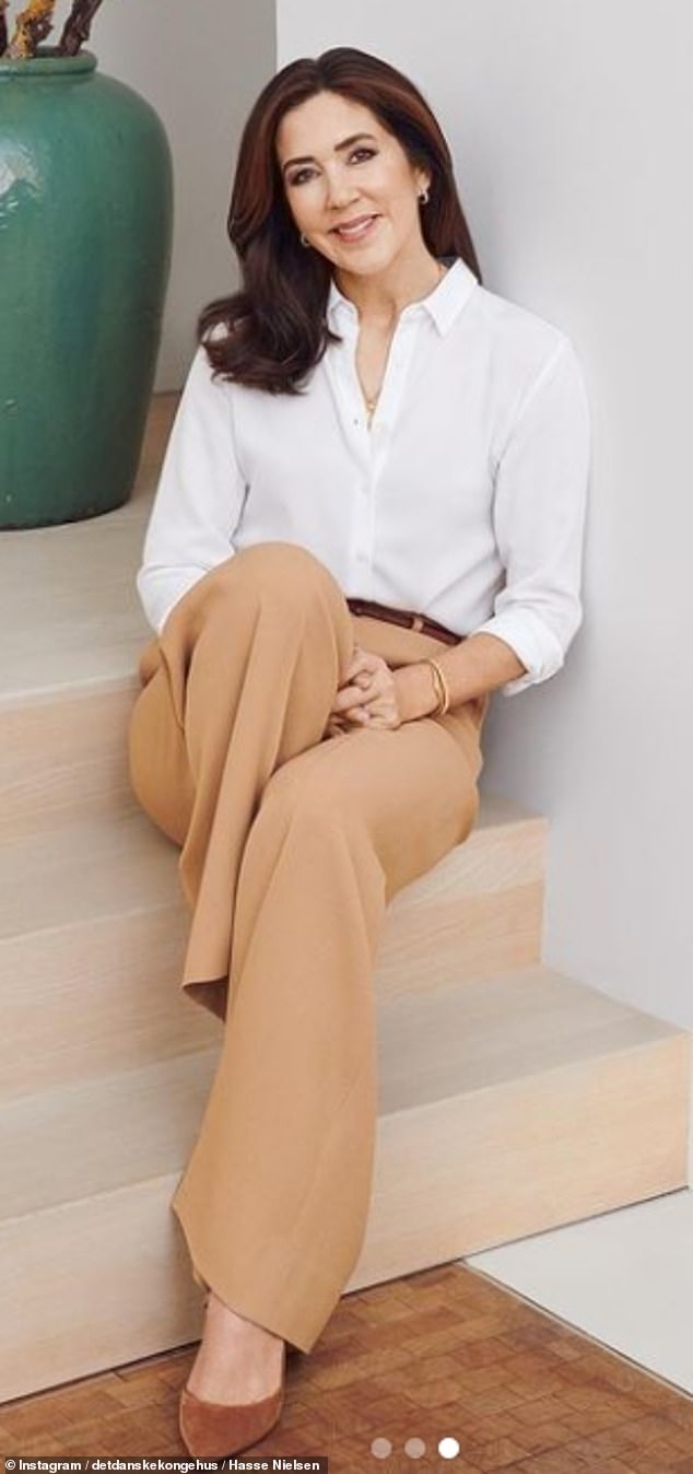 One last picture showed Mary posing by herself, in a stylish white and tan ensemble she styled with tan swede heels and well-chosen pieces of jewellery