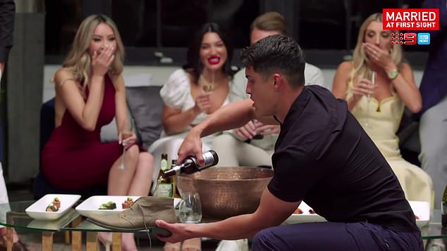 Breaking the ice: Just minutes into the cocktail party, the pocket rocket left his bride and co-stars speechless when he decided to take off his shoe and fill it with beer