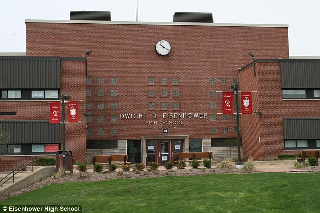 Michelle Alfano, 53, was punished for telling 15-year-old Shemar Cooper to get out of his seat at Eisenhower High School on Blue Island, Illinois, (pictured) during the Pledge of Allegiance
