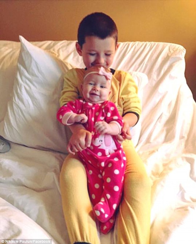 Life skills: Nikkole said she is teaching Lyle household tasks to ensure that he can take care of himself and do his 'fair share' around the home