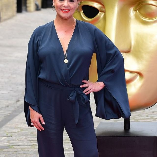 Lisa Armstrong appears defiant as she stuns in a navy jumpsuit